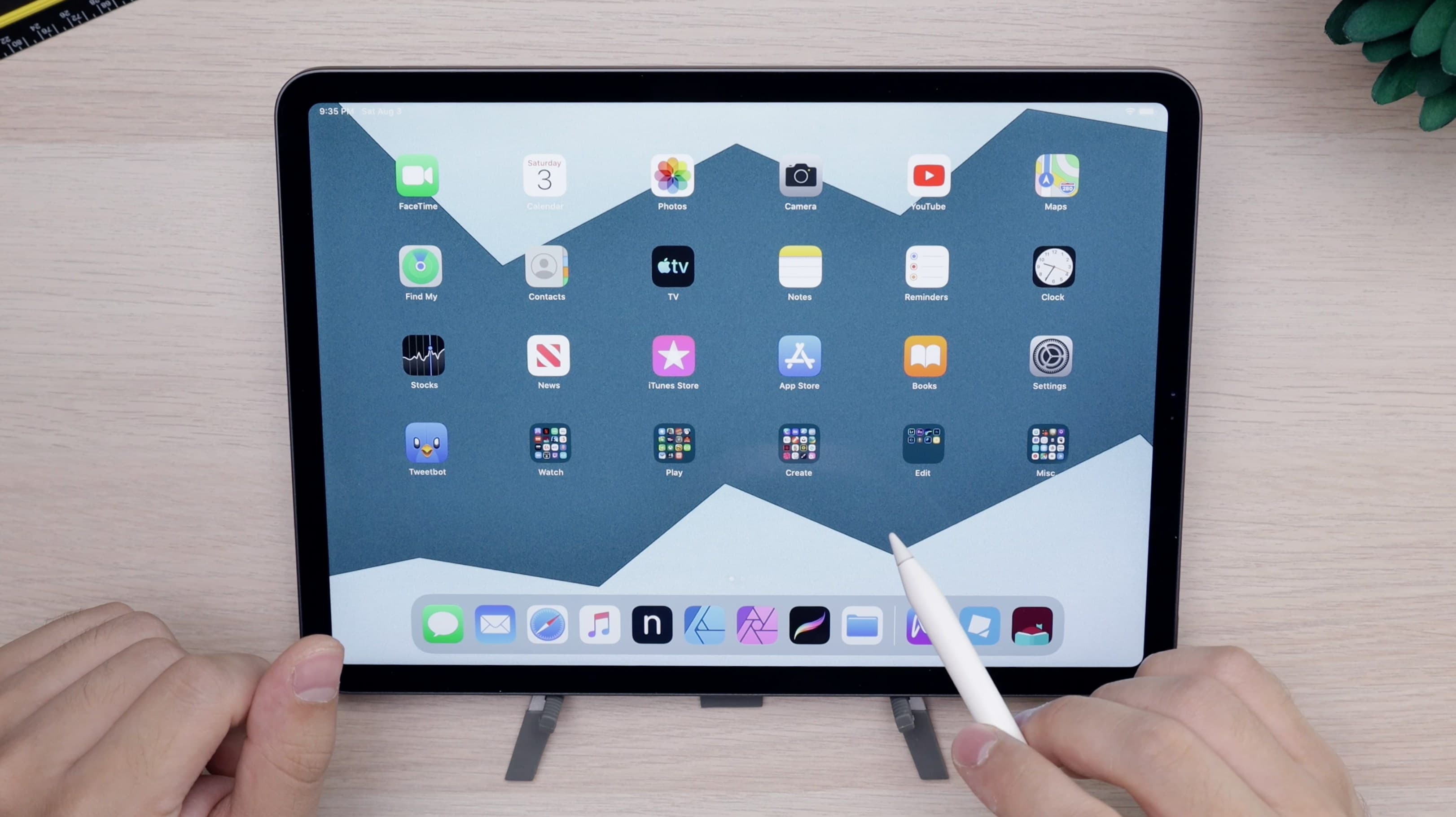iPad on desk with Apple Pencil
